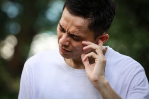 Man experiencing headache during the day